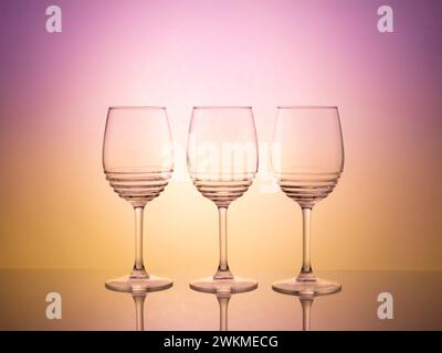 Colorful glassware photography with creative backlight and gel filters. Bright and vibrant image with abstract lighting effects. Ideal for graphic des Stock Photo