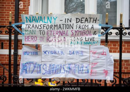 London, UK. 21st Feb, 2024. Tributes to Alexei Navalny are seen on the the fence of the Boris Nemstov Place opposite the Russian Embassy in London. Alexei Navalny of 47 years old died on the 16th of February 2024 in the Arctic penal colony after his morning walk according to the Russian official version. He was a fierce opponent of the Russian President Vladimir Putin. Since Navalny's death the mourners lay floral tributes for him outside the Russian Embassy in London. (Photo by Krisztian Elek/SOPA Images/Sipa USA) Credit: Sipa USA/Alamy Live News Stock Photo