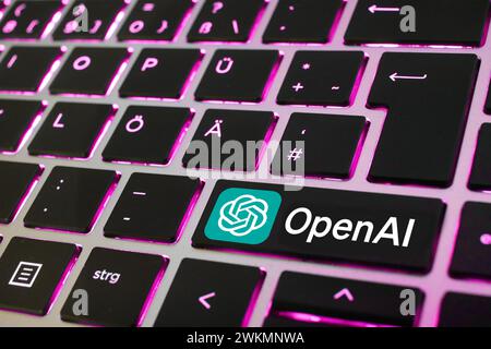 PHOTO MONTAGE! - Artificial Intelligence. Close-up of a laptop keyboard with an OpenAI key Stock Photo