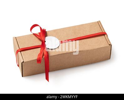 Closed rectangular shaped cardboard box with red ribbon isolated on white background Stock Photo