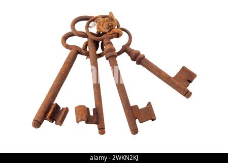 Rusty old keys. Four old keys tied with string. Vintage bunch of keys isolated on white with clipping path included Stock Photo