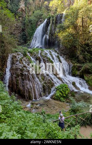 Parco Villa Gregoriana is a public setting in Tivoli along the Aniene River that includes lush canyons, caves meandering through the cliffs and large Stock Photo