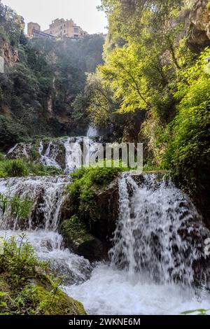 Parco Villa Gregoriana is a public setting in Tivoli along the Aniene River that includes lush canyons, caves meandering through the cliffs and large Stock Photo