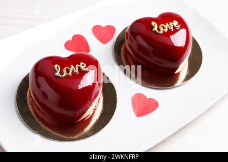 St. Valentine's Day. Delicious heart shaped cakes on table, closeup Stock Photo