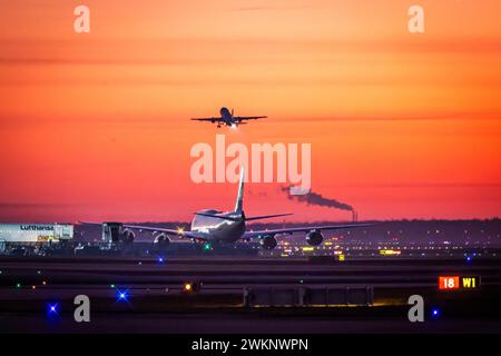 Early in the morning at the airport in front of sunrise, a Boeing 747 aircraft stands ready for take-off on the runway, Fraport, Frankfurt am Main Stock Photo