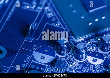electronic components and microchips on computer circuit board. extreme closeup. Stock Photo