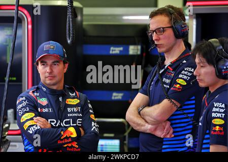 Sakhir, Bahrain. 22nd Feb, 2024. (L to R): Sergio Perez (MEX) Red Bull Racing with Hugh Bird (GBR) Red Bull Racing Engineer. Formula One Testing, Day Two, Thursday 22nd February 2024. Sakhir, Bahrain. Credit: James Moy/Alamy Live News Stock Photo