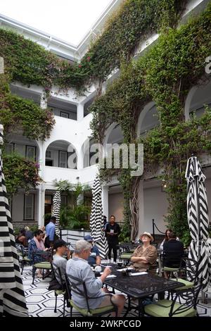 Winchester Mansions Boutique Hotel Courtyard Breakfast in Sea Point, Cape Town - South Africa Stock Photo