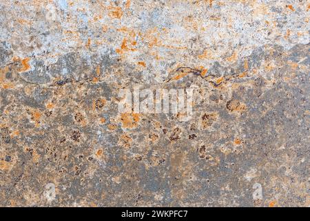 Rust texture with spots and irregularities on a metal sheet. Stock Photo
