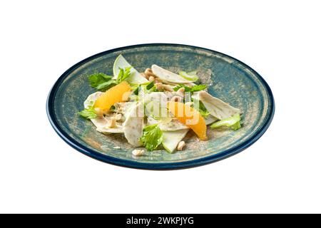 healthy and fresh artichoke salad with oranges and hazelnut on white background Stock Photo