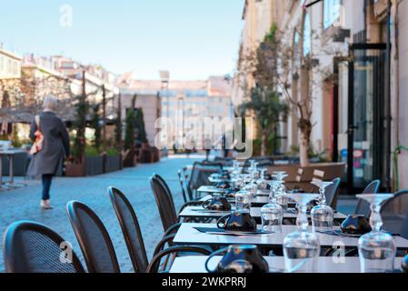 Cafe tables with tableware in the city Stock Photo