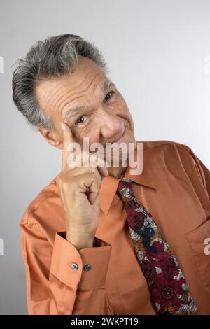 An elderly man in deep thoughts Stock Photo