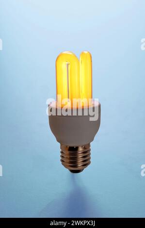 warm light of a luminous energy-saving lamp, Philips Stock Photo