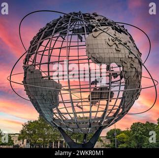 The Unisphere at sunrise or sunset with the metal structure representing the planet Earth, located in Flushing Meadows-Corona Park in Queens, New York Stock Photo