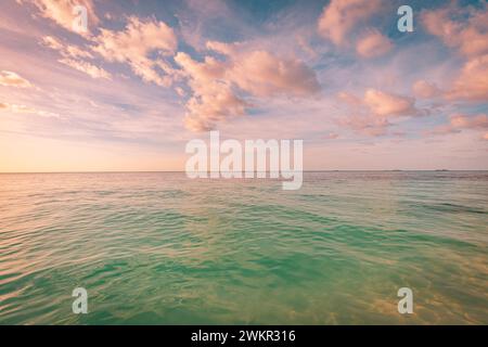 Tranquil seascape. Inspirational calm sea with sunset sky. Meditation dawn ocean and sky background. Colorful sunrise horizon over the water Stock Photo