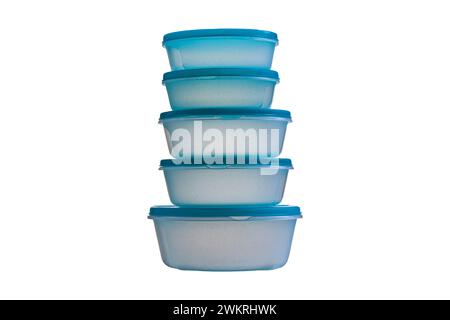 stack of round plastic food containers with lids isolated on white background Stock Photo