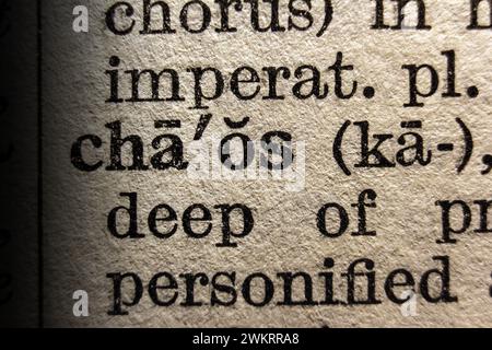 Definition of word chaos on dictionary page, close-up Stock Photo