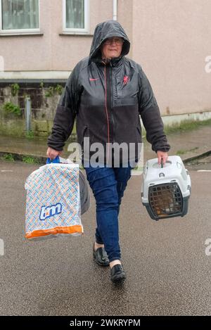 Teresa Cork and her cat being evacuated after a suspected Second World ...