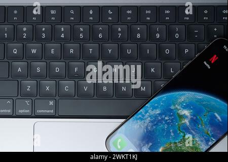 New York, USA - February 20, 2024: Netflix app for iphone smartphone screen with keyboard background Stock Photo