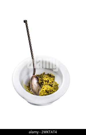 Italian Pesto in marble mortar. Isolated on white background Stock Photo