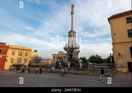 The tall Triunfo de San Rafael de la Puerta del Puente is an 18th-century monument that features the Archangel Raphael and the guardian angel of Cordo Stock Photo