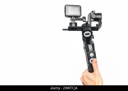 Stabilizer for smartphones, action cameras. Shooting videos and photos with balanced, calm movement Stock Photo