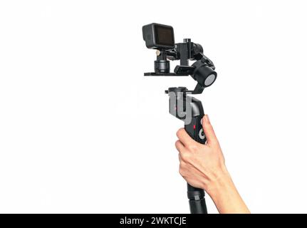 Stabilizer for smartphones, action cameras. Shooting videos and photos with balanced, calm movement Stock Photo