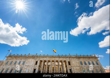 National Capitol in Bogota, Colombia with a bright blue sky and the sun visible Stock Photo