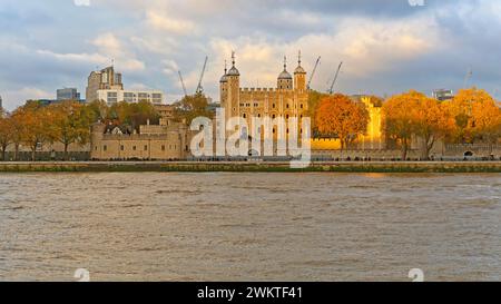 London, United Kingdom - November 23, 2013: Royal Palace and Fortress White Tower of London at Thames RIver in Capital City. Stock Photo