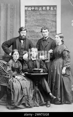 George Stott, John (James) W. Stevenson, and his wife Anne Stevenson, along with (seated) Mrs. and Mr. George Vigeon, in 1865 prior to Stott and the Stevensons departing Britain for China as pioneer missionaries with Hudson Taylor's China Inland Mission. Stock Photo
