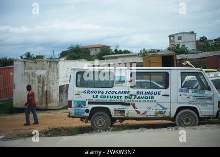 White school bus in Africa Stock Photo