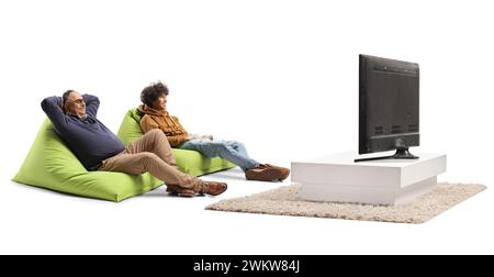Mature and young man sitting on a green beanbag chair and relaxing in front of tv isolated on white background Stock Photo