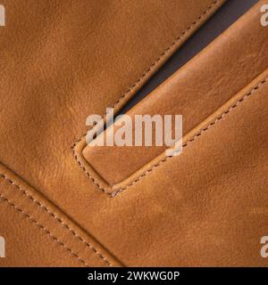 Pocket detail of a beige leather jacket close up Stock Photo