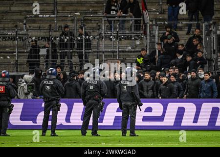 Frankfurt Am Main, Germany. 22nd Feb, 2024. German suppporters facing the policemen after a soccer game between Germany's Eintracht Frankfurt and Belgians Royale Union Saint Gilloise, on Thursday 22 February 2024 in Frankfurt am Main, Germany, the return leg of the play offs phase of the UEFA Conference League competition. The first leg ended in a 2-2 draw. BELGA PHOTO LAURIE DIEFFEMBACQ Credit: Belga News Agency/Alamy Live News Stock Photo