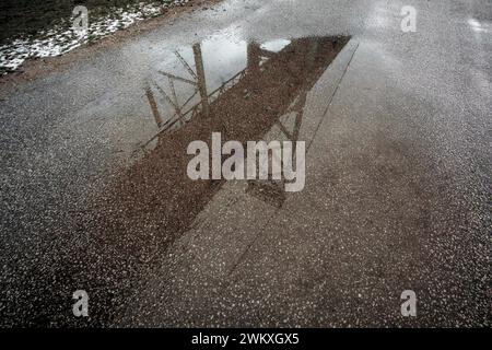 Windsor Ontario Ambassador Rainy Bridge Reflections in concrete Stock Photo