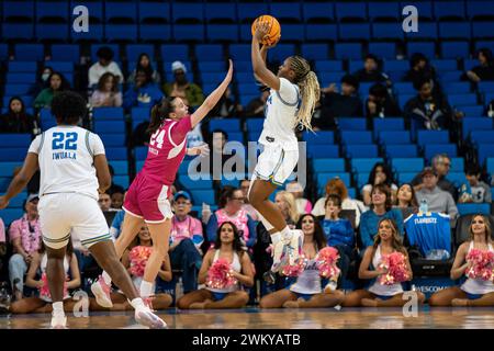 UCLA Bruins guard Charisma Osborne (20) shoots over Utah Utes guard Kennady McQueen (24) during a NCAA women’s basketball game, Thursday, February 22, Stock Photo