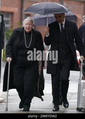 Emma Caldwell's mother, Margaret Caldwell, and solicitor Aamer Anwar arriving at Glasgow High Court where Iain Packer is on trial for the murder of 27-year-old Emma, who vanished in Glasgow on April 4, 2005, and whose body was found in Limefield Woods, near Roberton, South Lanarkshire, the following month. Packer faces a total of 36 charges involving offences against 25 women, all of which he denies. Picture date: Friday February 23, 2024. Stock Photo
