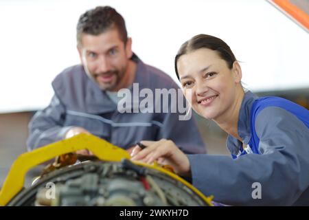 male and female engineers working together Stock Photo