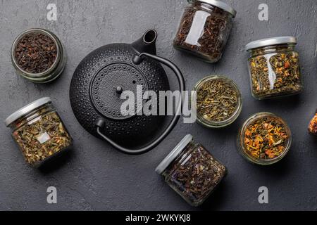 Tea time assortment: Various dry tea leaves. Flat lay Stock Photo