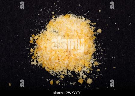 When the candy comes into contact with moisture, such as saliva in your mouth, the pressurized carbon dioxide is released, causing the candy to pop an Stock Photo
