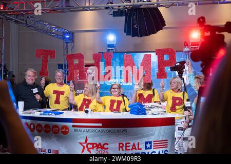 Oxon Hill, United States. 22nd Feb, 2024. Steve Bannon talks to a group of people holding up the letters to spell Trump at the 2024 Conservative Political Action Conference (CPAC) in National Harbor, Maryland, U.S., on Thursday, February 22, 2024. Credit: Annabelle Gordon /CNP/Sipa USA Credit: Sipa USA/Alamy Live News Stock Photo