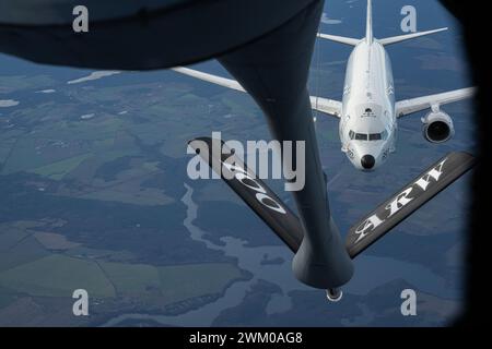 A U.S. Navy P-8 Poseidon approaches a KC-135 for aerial refueling over Poland, Dec. 28, 2023. Photo by Christopher Campbell Stock Photo