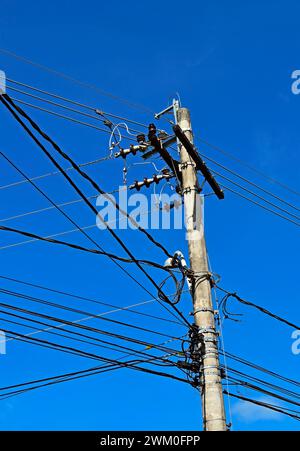 Concrete electric pole for transmission of wired electricity Stock Photo