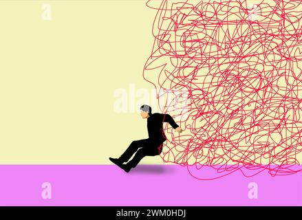Man struggling to hold back large tangled strings Stock Photo