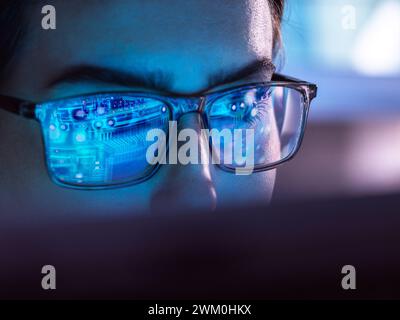 IT professional developing chip design on computer Stock Photo