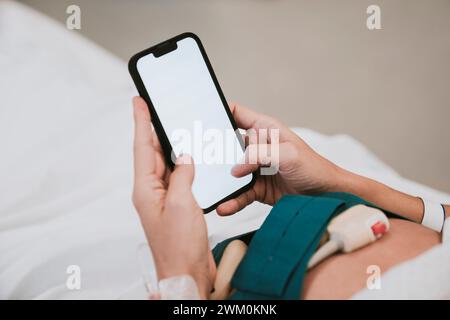 Hands of pregnant woman using mobile phone Stock Photo