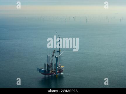 Netherlands, North Holland, IJmuiden, Aerial view of wind turbine installation vessel at offshore wind farm Stock Photo