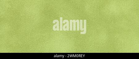 Light green matte background of suede fabric, closeup. Velvet texture of seamless olive leather. Stock Photo