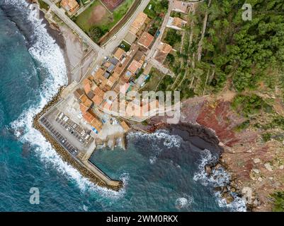 Spain, Balearic Islands, Port de Valldemossa, Aerial view of fishing village on Majorca island Stock Photo
