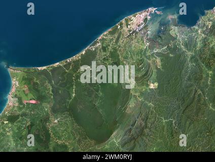 Color satellite image of Brunei. The country is  located on the north coast of the island of Borneo in Southeast Asia. Stock Photo